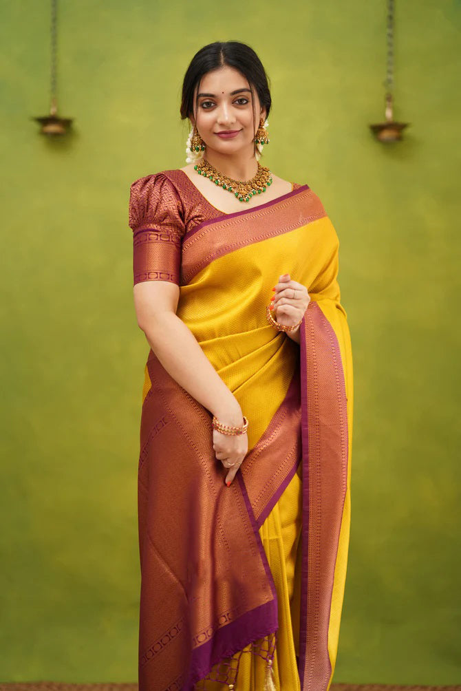 Opulent Golden Color Kanjivaram Silk Saree With Blouse Piece