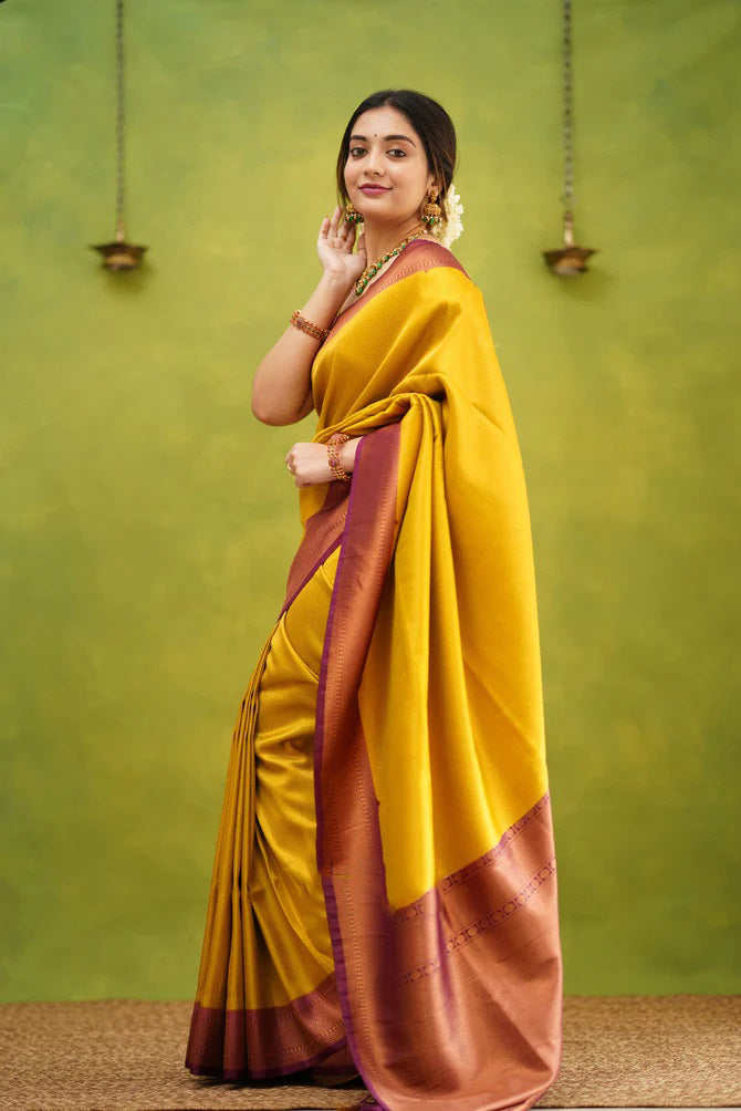 Opulent Golden Color Kanjivaram Silk Saree With Blouse Piece