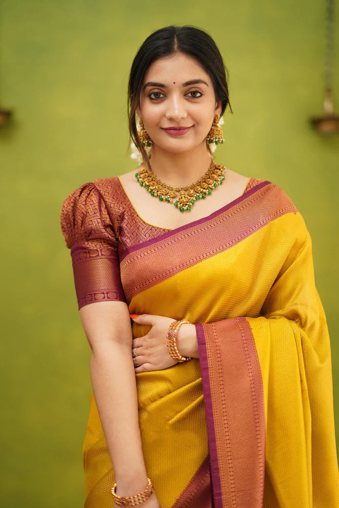 Opulent Golden Color Kanjivaram Silk Saree With Blouse Piece