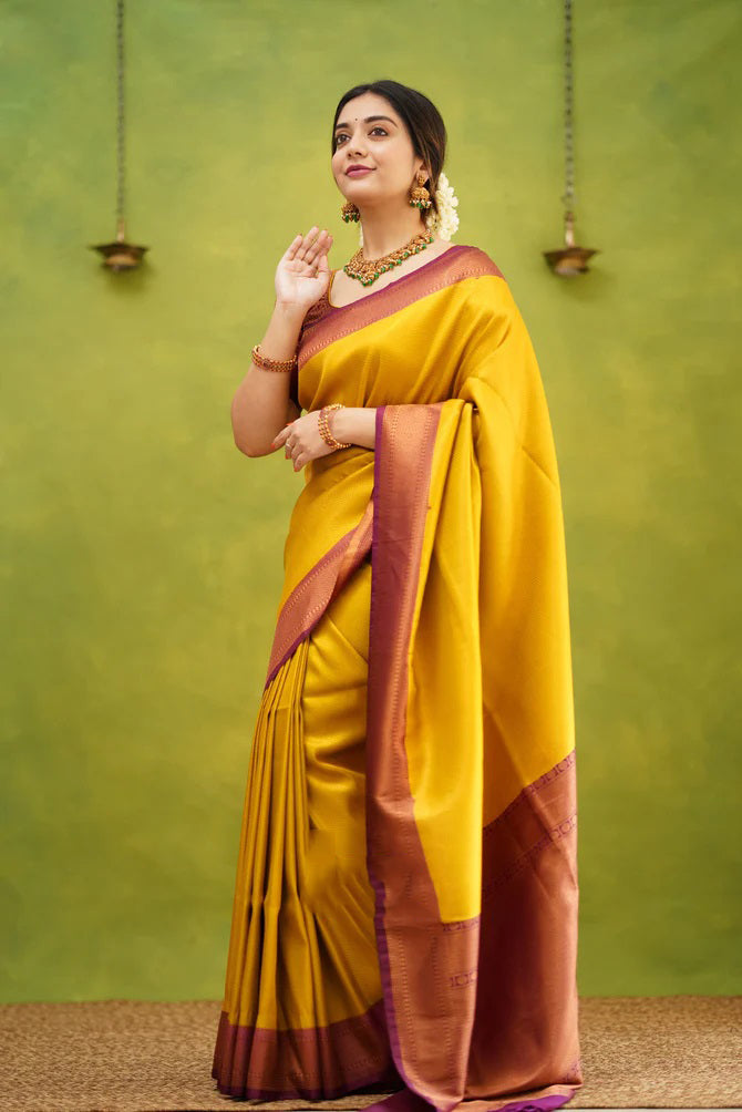 Opulent Golden Color Kanjivaram Silk Saree With Blouse Piece