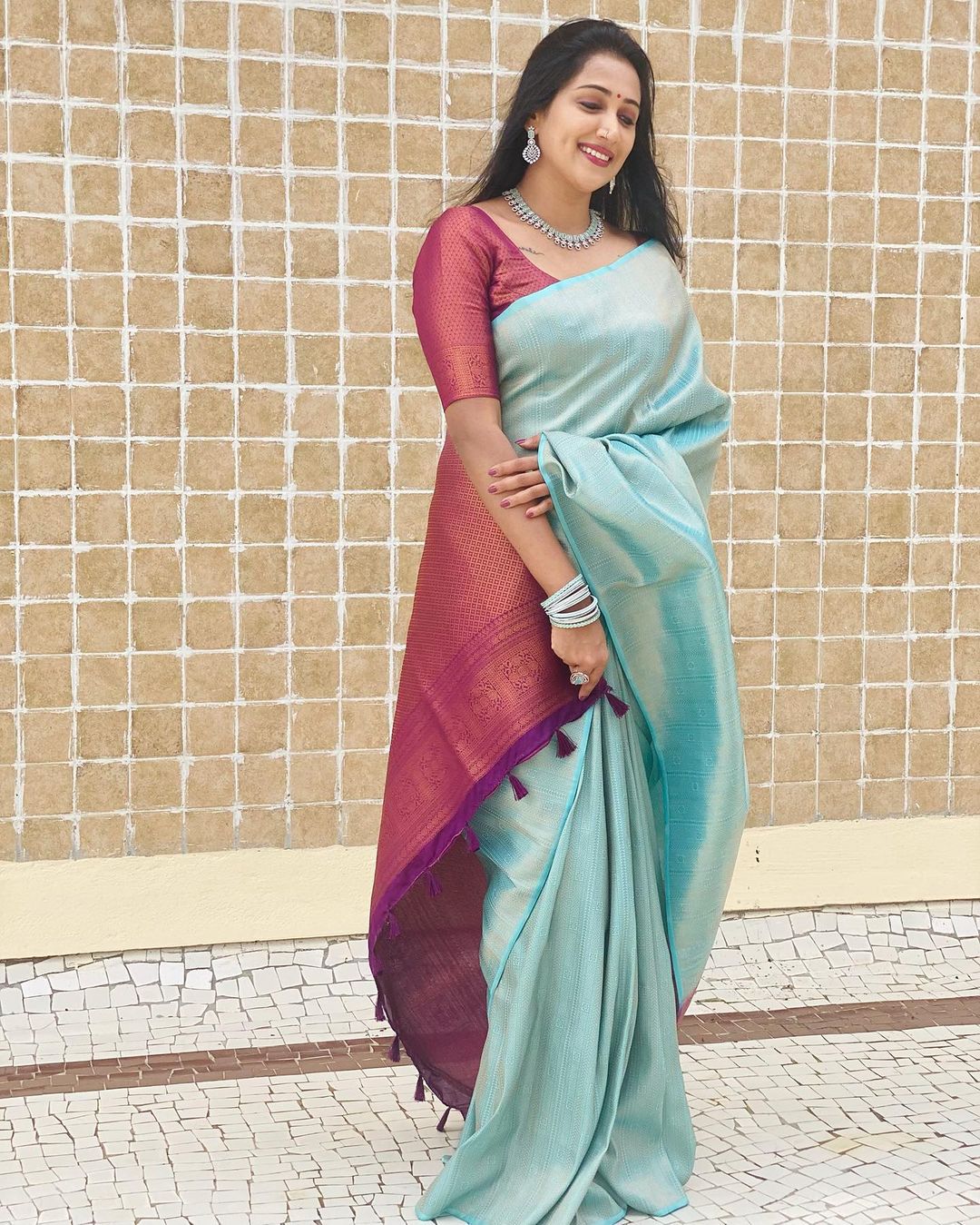 Captivating Firozi Color Soft Lichi Silk Saree With Blouse Piece