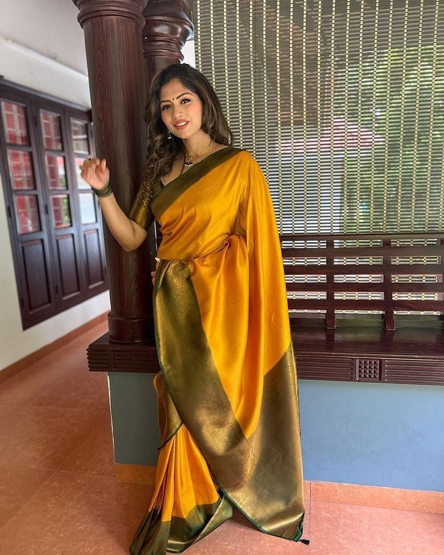 Tranquil Yellow Color Soft Lichi Silk Saree With Blouse Piece