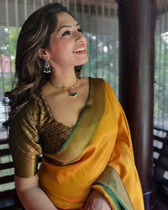 Tranquil Yellow Color Soft Lichi Silk Saree With Blouse Piece