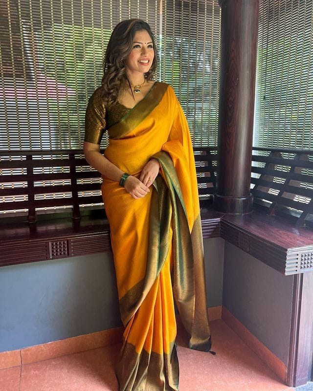 Tranquil Yellow Color Soft Lichi Silk Saree With Blouse Piece