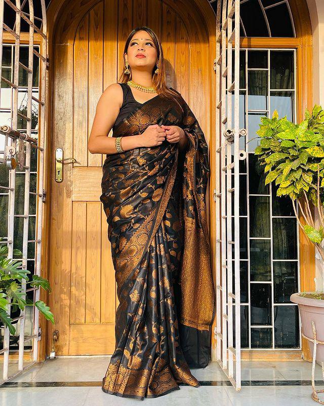 Picturesque Black Color Banarasi Soft Silk Saree With Blouse Piece