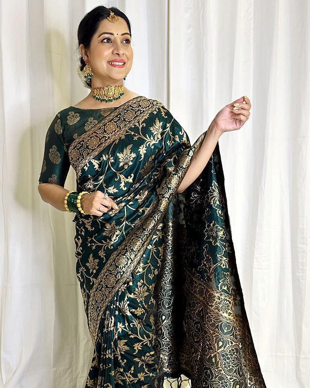 Exotic Dark Green Color Banarasi Soft Silk Saree With Blouse Piece