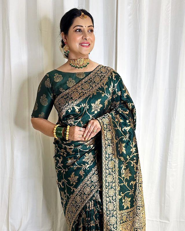 Exotic Dark Green Color Banarasi Soft Silk Saree With Blouse Piece