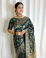 Exotic Dark Green Color Banarasi Soft Silk Saree With Blouse Piece