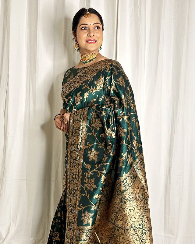 Exotic Dark Green Color Banarasi Soft Silk Saree With Blouse Piece