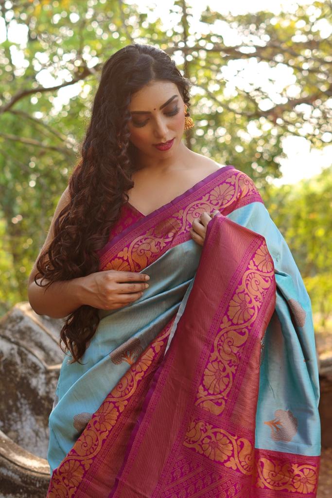 Polished Sky Blue Color Banarasi Soft Silk Saree With Blouse Piece