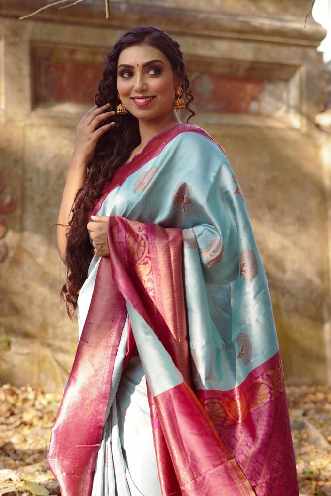 Polished Sky Blue Color Banarasi Soft Silk Saree With Blouse Piece