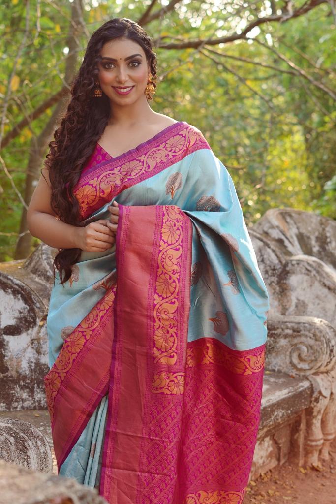 Polished Sky Blue Color Banarasi Soft Silk Saree With Blouse Piece