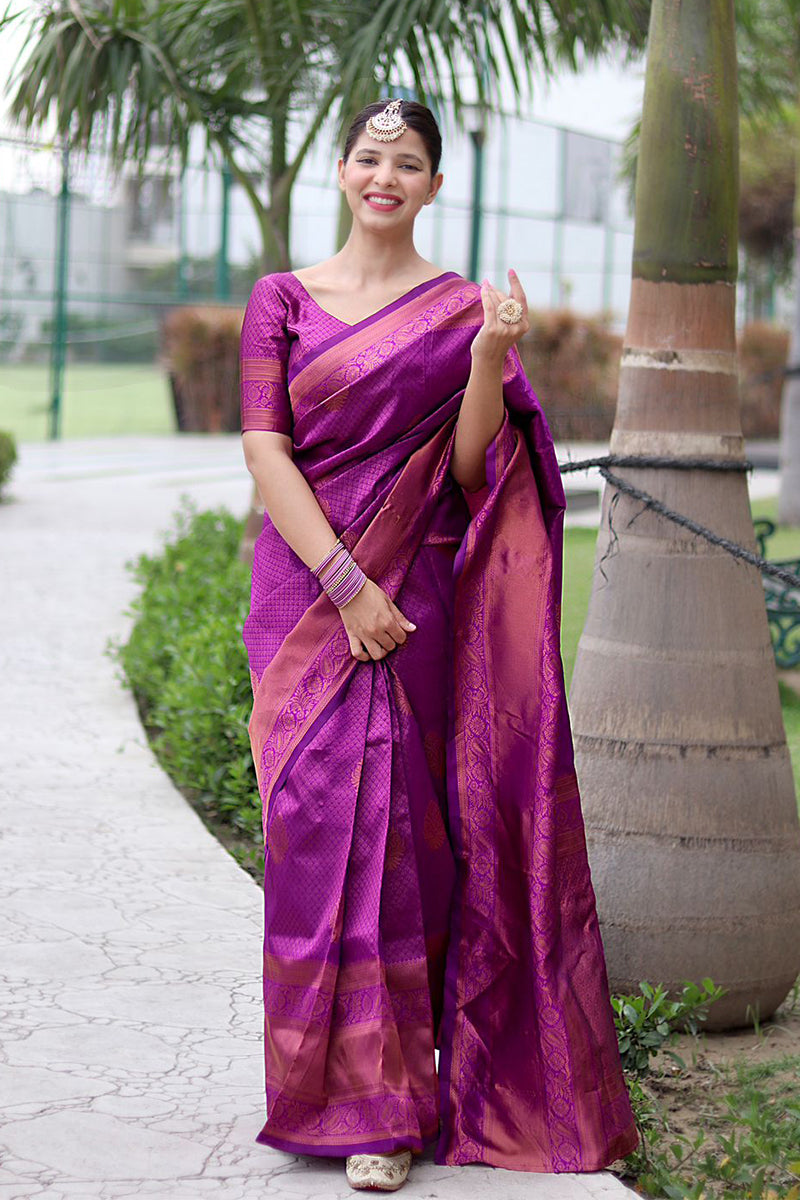 Dazzling Purple Color Banarasi Soft Silk Saree With Blouse Piece