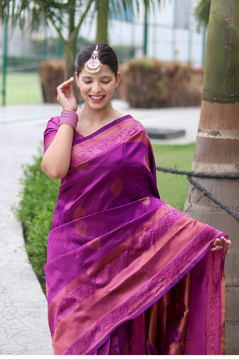 Dazzling Purple Color Banarasi Soft Silk Saree With Blouse Piece