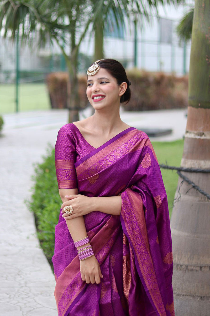 Dazzling Purple Color Banarasi Soft Silk Saree With Blouse Piece