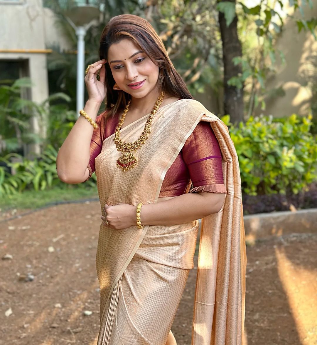 Angelic Cream Color Soft Lichi Silk Saree With Blouse Piece