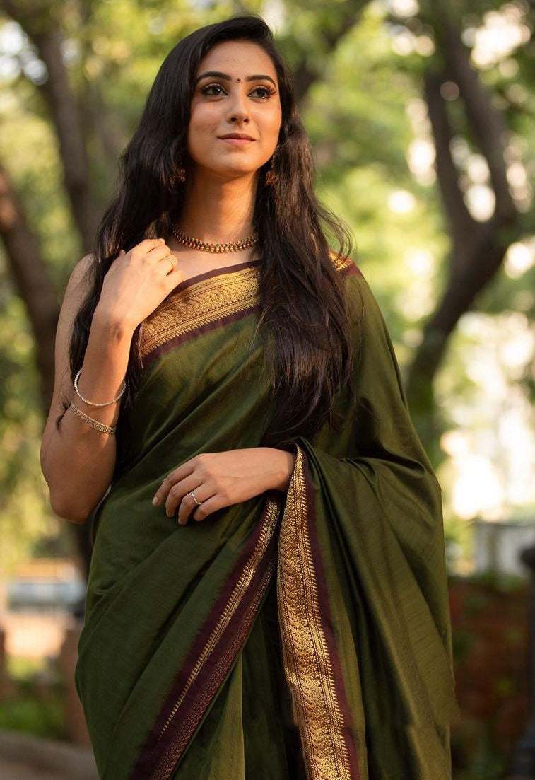 Mesmerizing Green Color Banarasi Soft Silk Saree With Blouse Piece