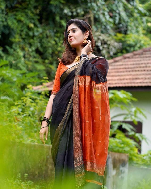 Lively Black Color Soft Lichi Silk Saree With Blouse Piece