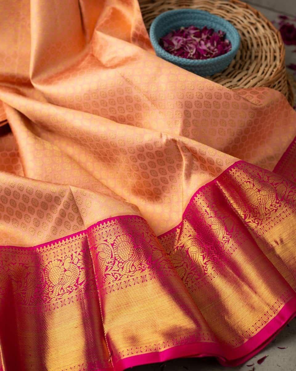 Splendid Peach Color Banarasi Soft Silk Saree With Blouse Piece