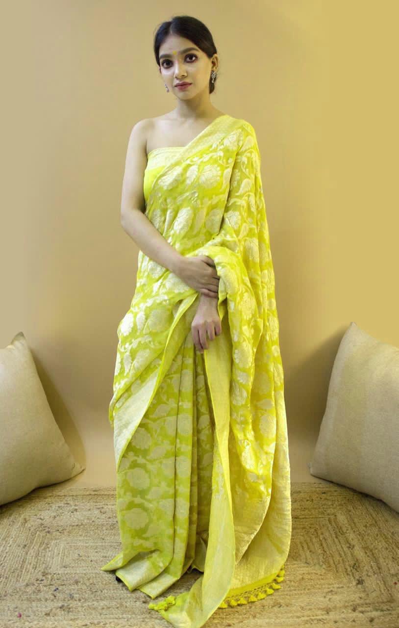 Dynamic Yellow Color Soft Lichi Silk Saree With Blouse Piece