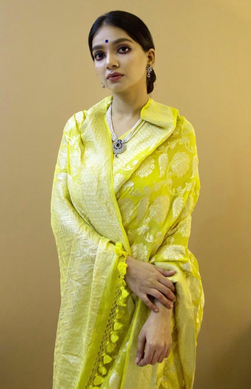 Dynamic Yellow Color Soft Lichi Silk Saree With Blouse Piece