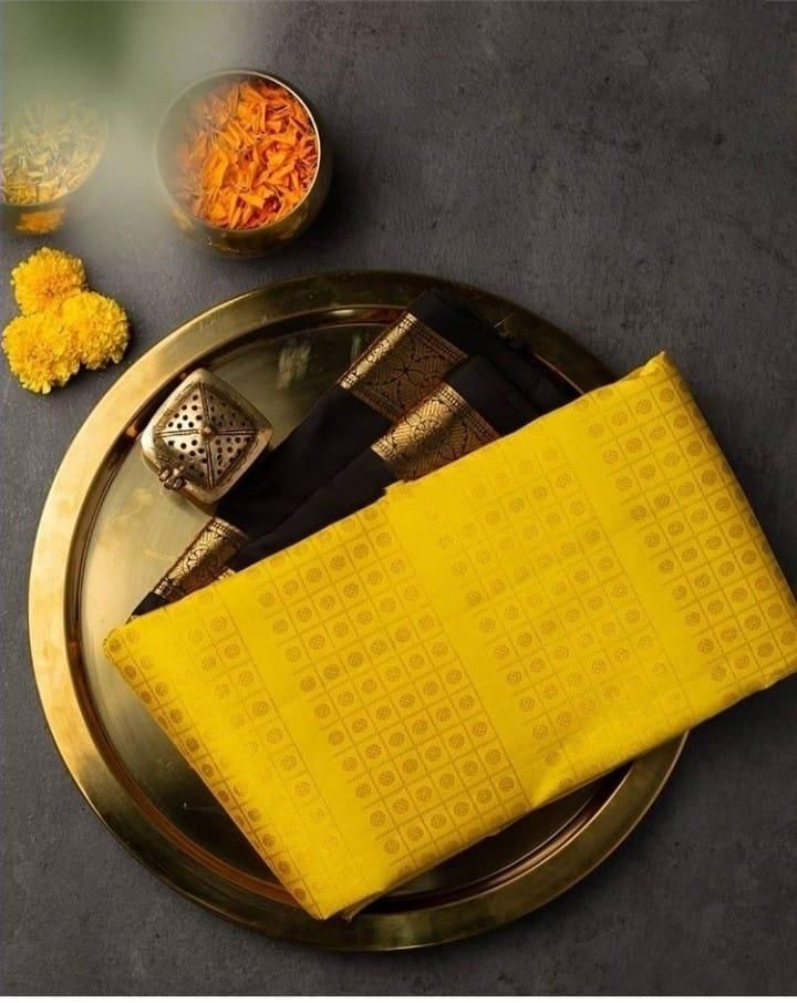 Bewitching Yellow Color Banarasi Soft Silk Saree With Blouse Piece