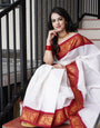 Captivating Off White Color Banarasi Soft Silk Saree With Blouse Piece