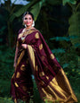 Graceful Wine Color Banarasi Soft Silk Saree With Blouse Piece