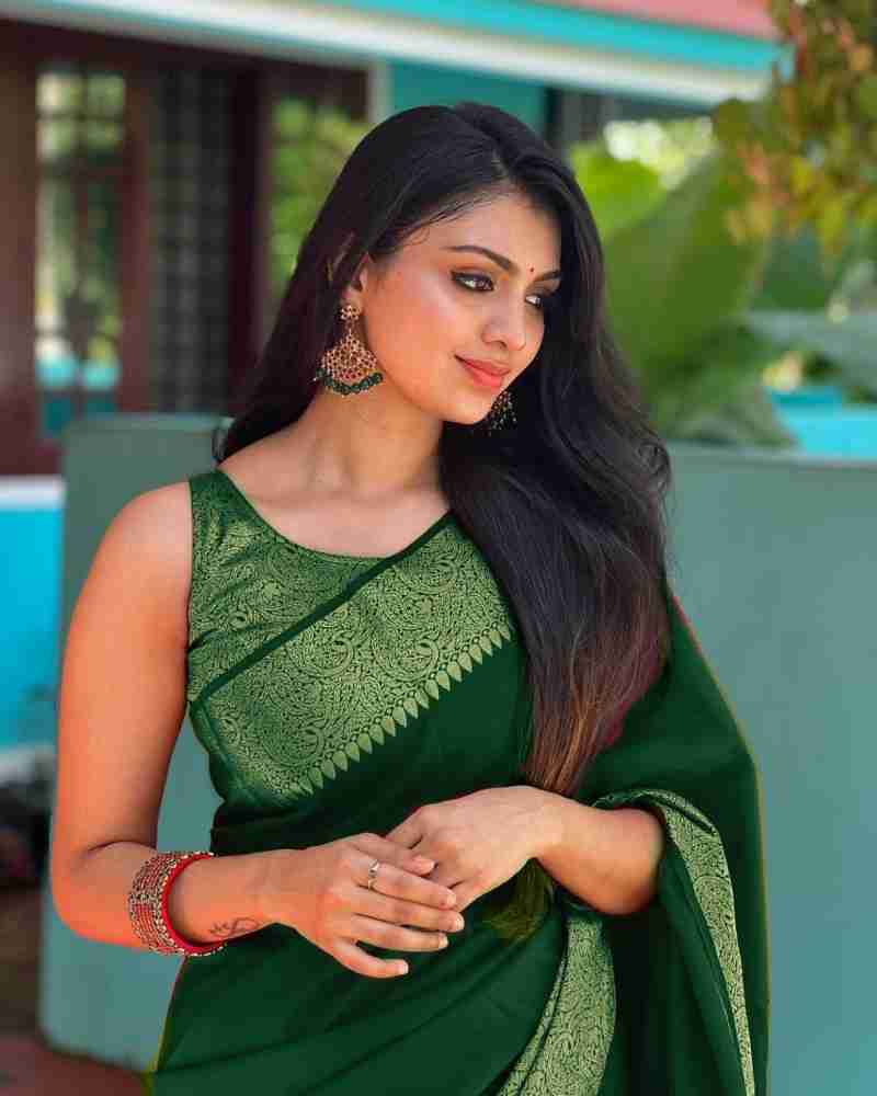 Glowing Green Color Soft Lichi Silk Saree With Blouse Piece