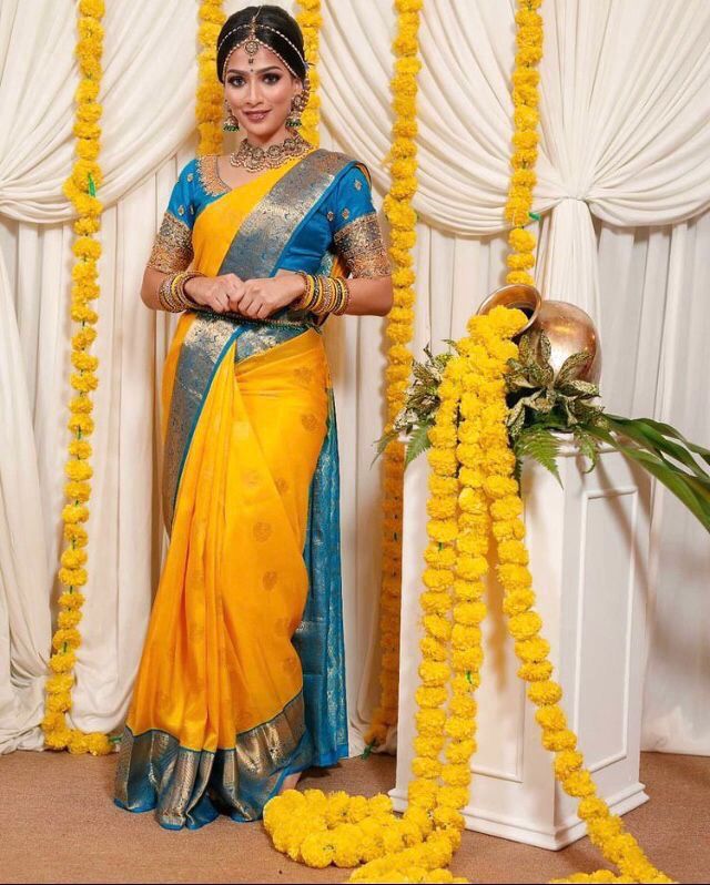 Enchanting Yellow Color Banarasi Soft Silk Saree With Blouse Piece