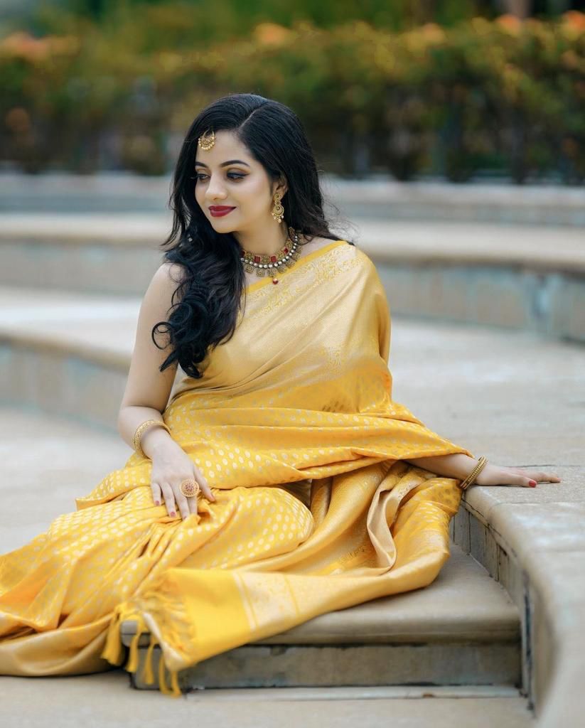 Radiant Yellow Color Banarasi Soft Silk Saree With Blouse Piece