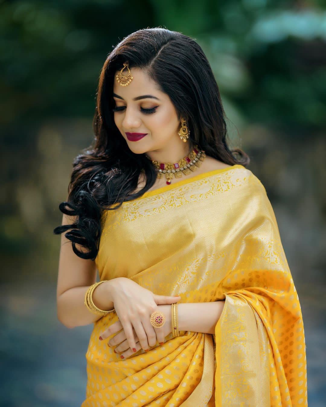 Radiant Yellow Color Banarasi Soft Silk Saree With Blouse Piece