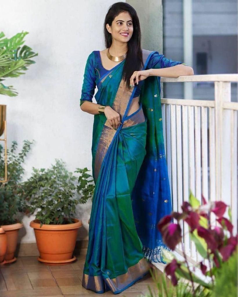 Eclipsing Rama Green Color Soft Lichi Silk Saree With Blouse Piece