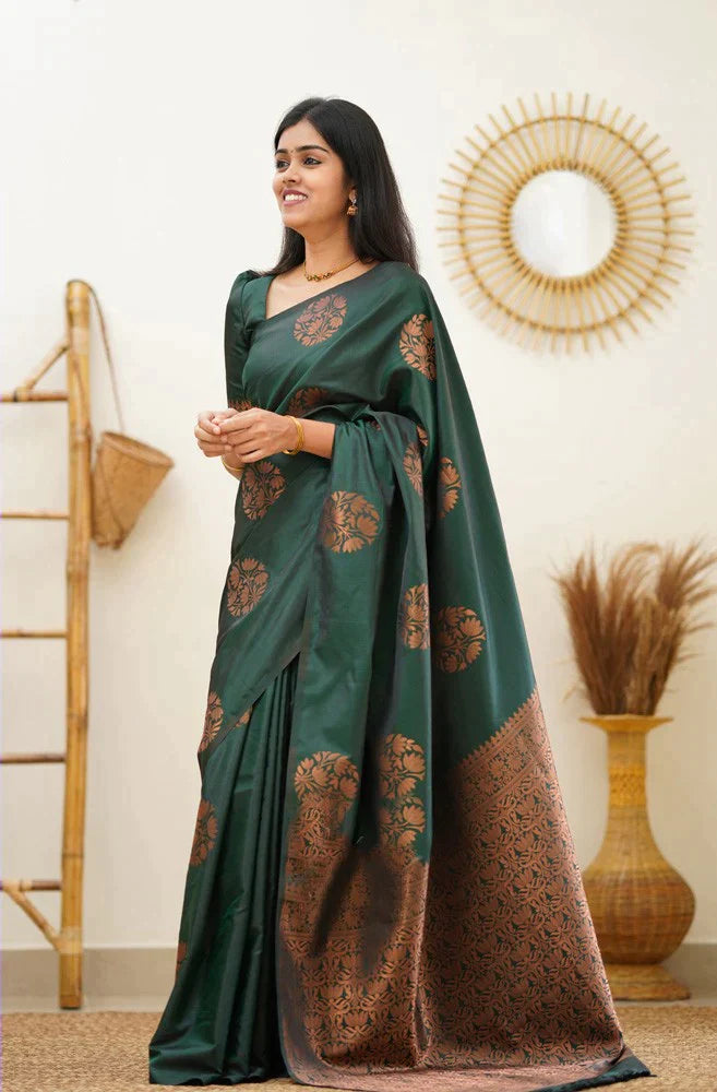 Sublime Dark Green Color Soft Lichi Silk Saree With Blouse Piece