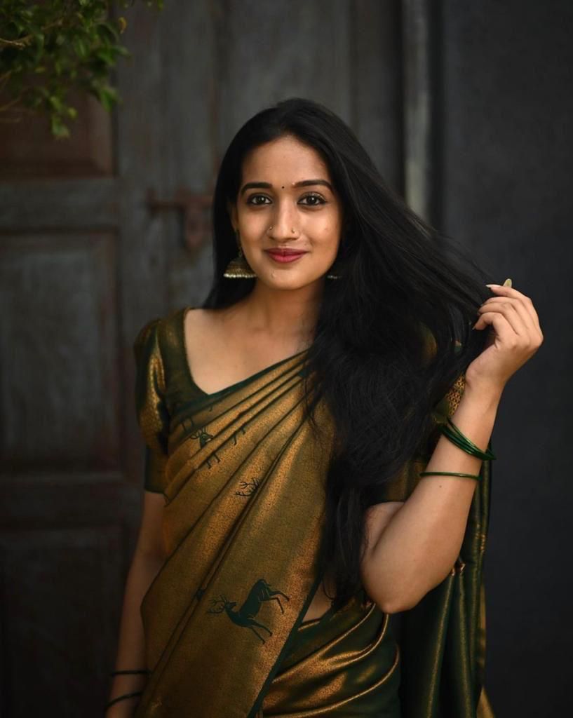 Whimsical Dark Green Color Soft Lichi Silk Saree With Blouse Piece