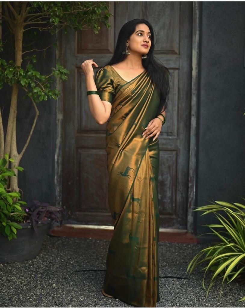 Whimsical Dark Green Color Soft Lichi Silk Saree With Blouse Piece