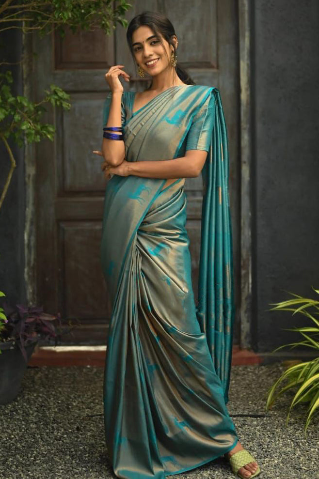 Reflective Sky Blue Color Soft Lichi Silk Saree With Blouse Piece