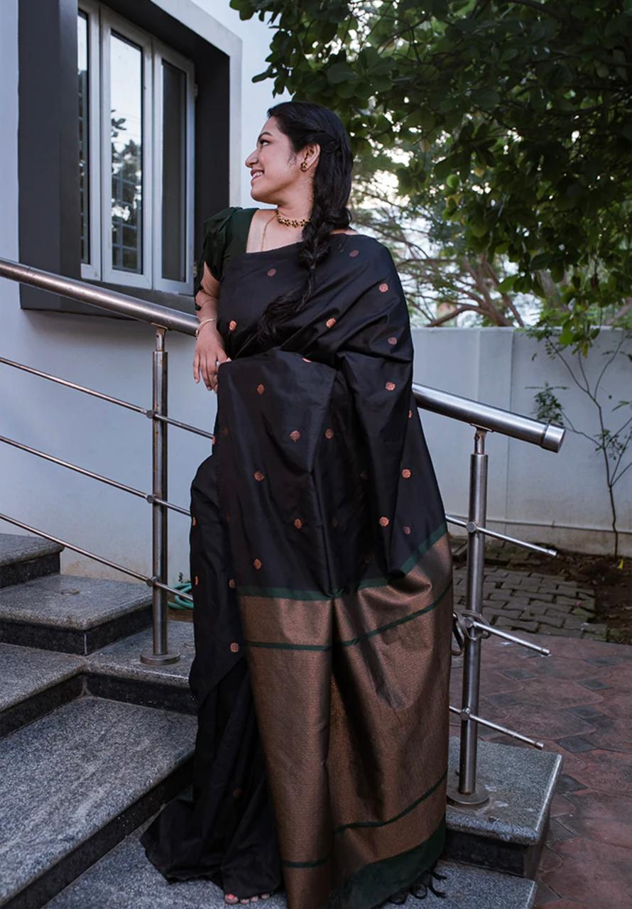 Gleaming Black Color Soft Lichi Silk Saree With Blouse Piece