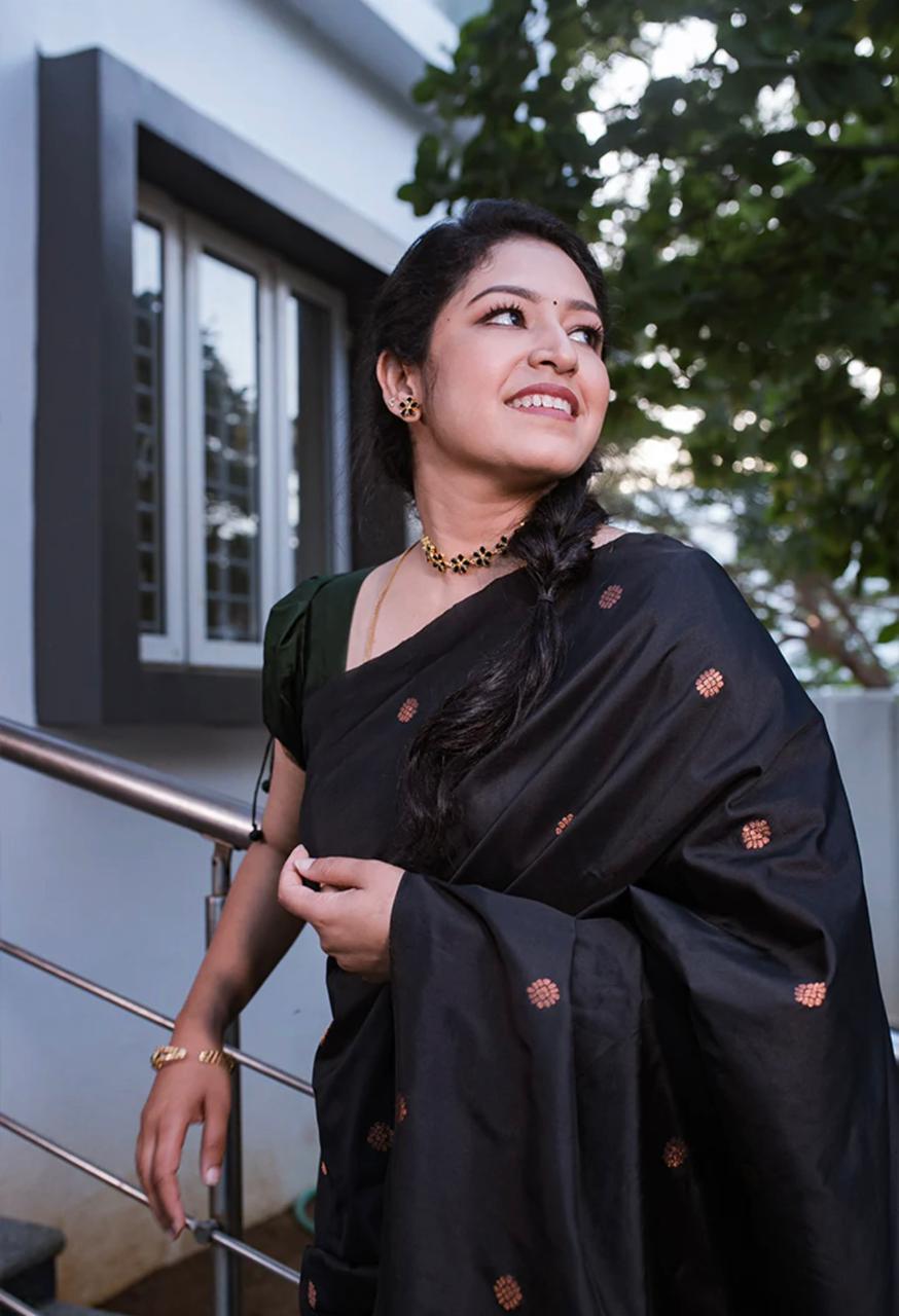 Gleaming Black Color Soft Lichi Silk Saree With Blouse Piece