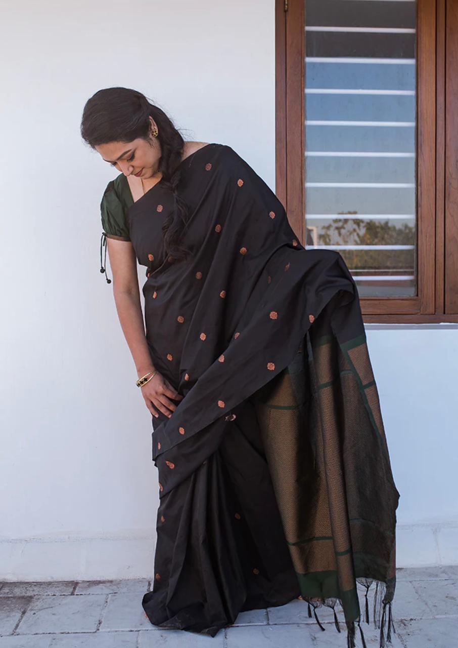 Gleaming Black Color Soft Lichi Silk Saree With Blouse Piece