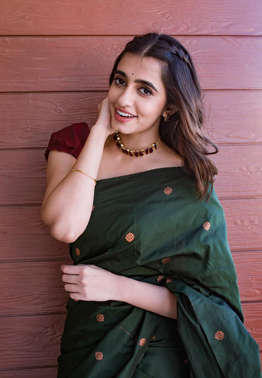 Exotic Dark Green Color Soft Lichi Silk Saree With Blouse Piece