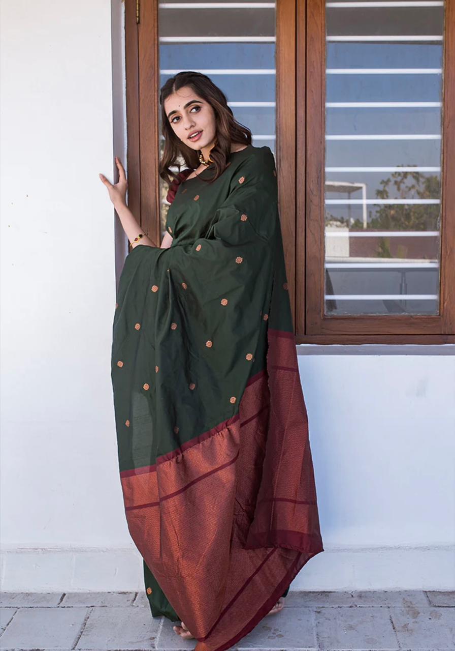 Exotic Dark Green Color Soft Lichi Silk Saree With Blouse Piece