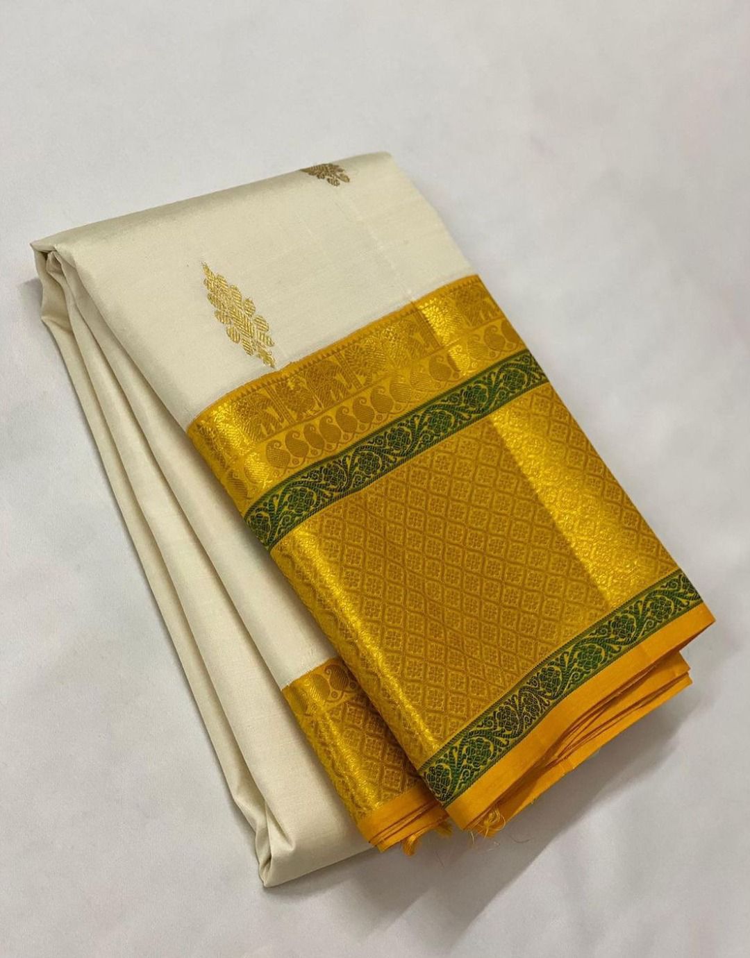 Tranquil Off White Color Soft Lichi Silk Saree With Blouse Piece