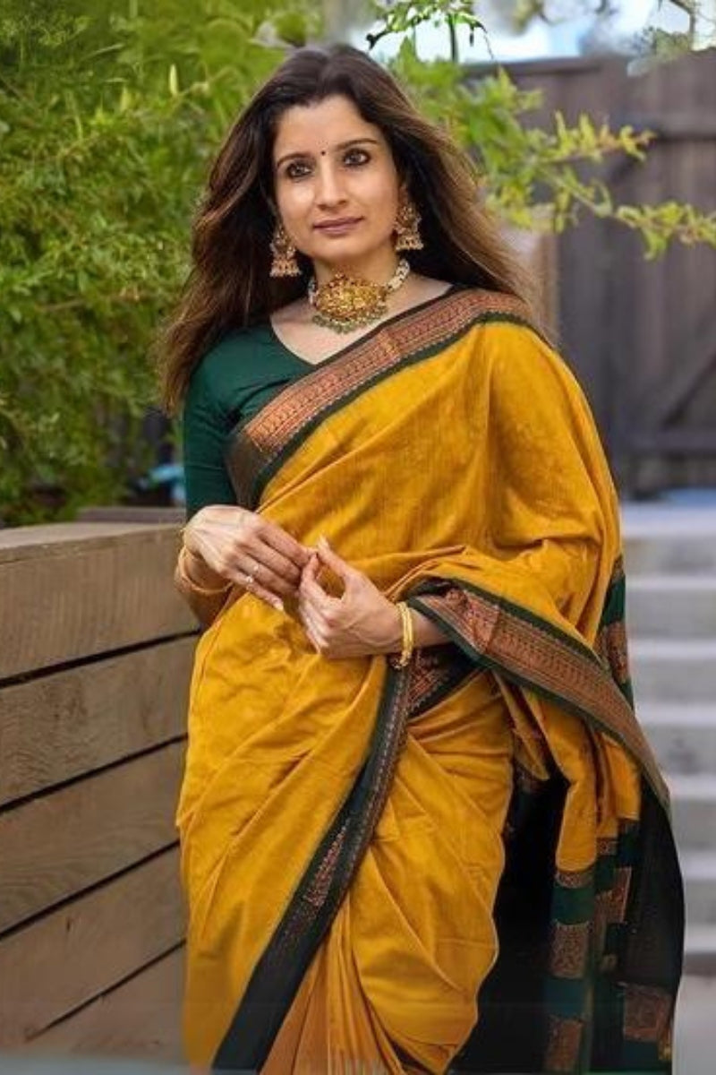 Smoldering Mustard Color Soft Lichi Silk Saree With Blouse Piece