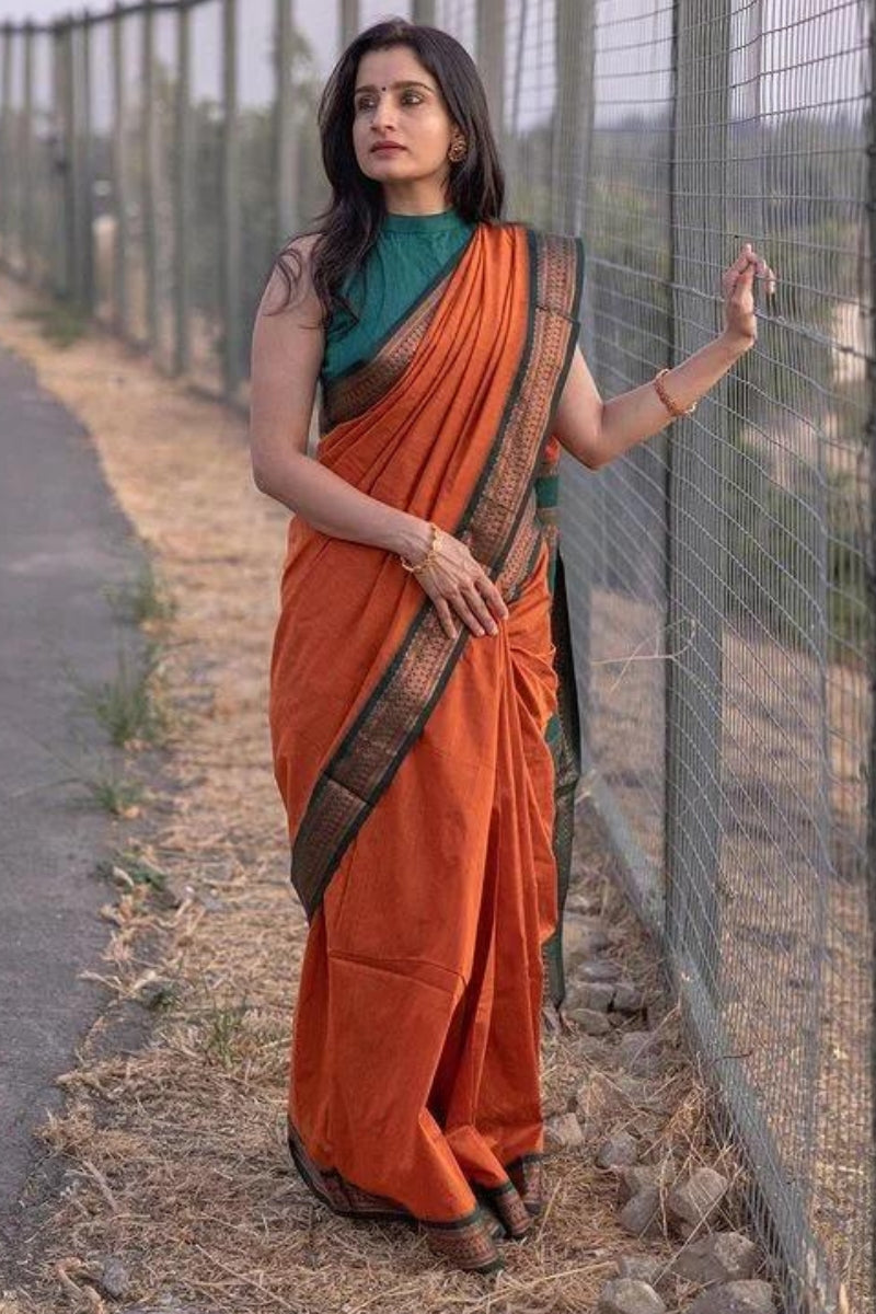 Divine Orange Color Soft Lichi Silk Saree With Blouse Piece