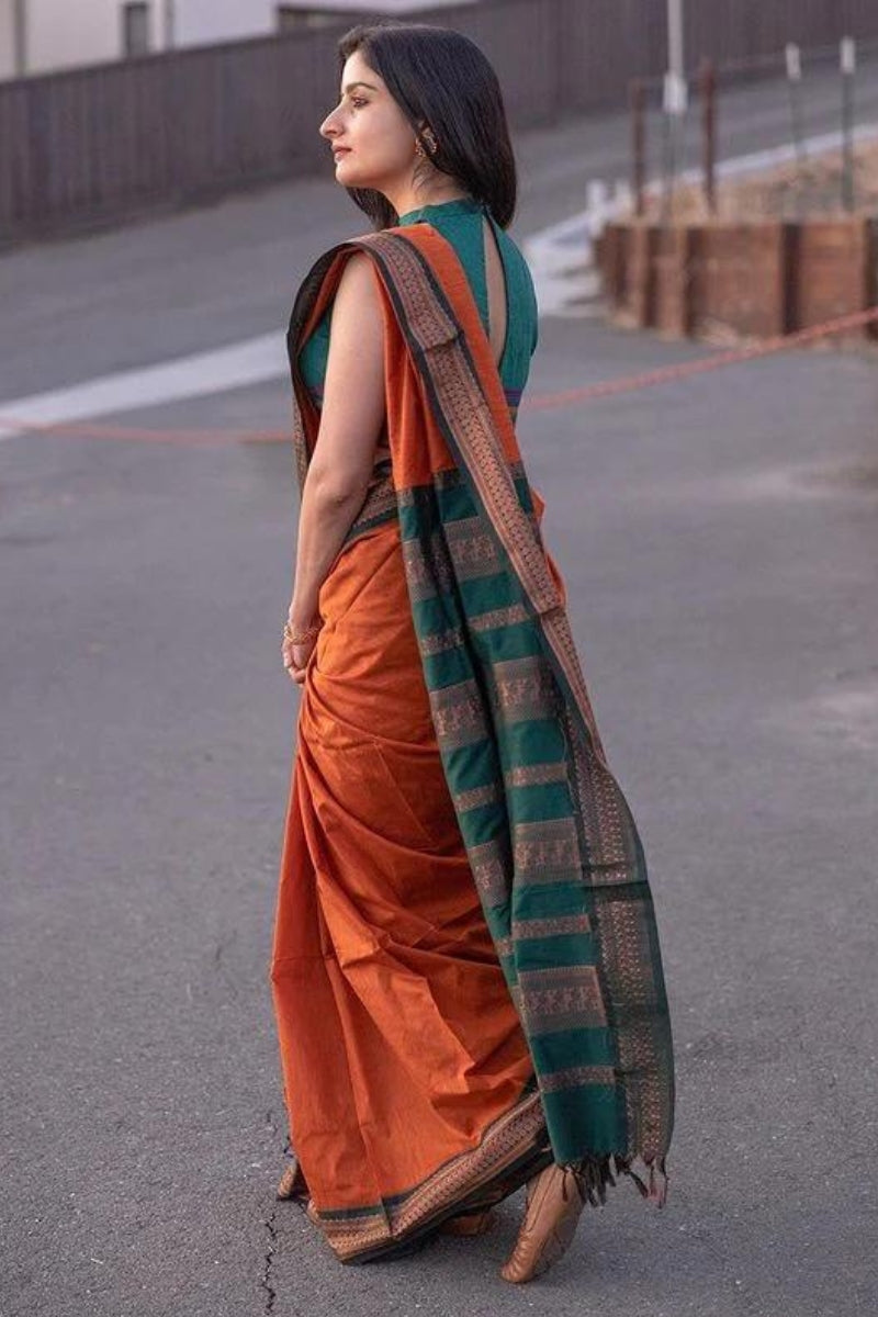 Divine Orange Color Soft Lichi Silk Saree With Blouse Piece