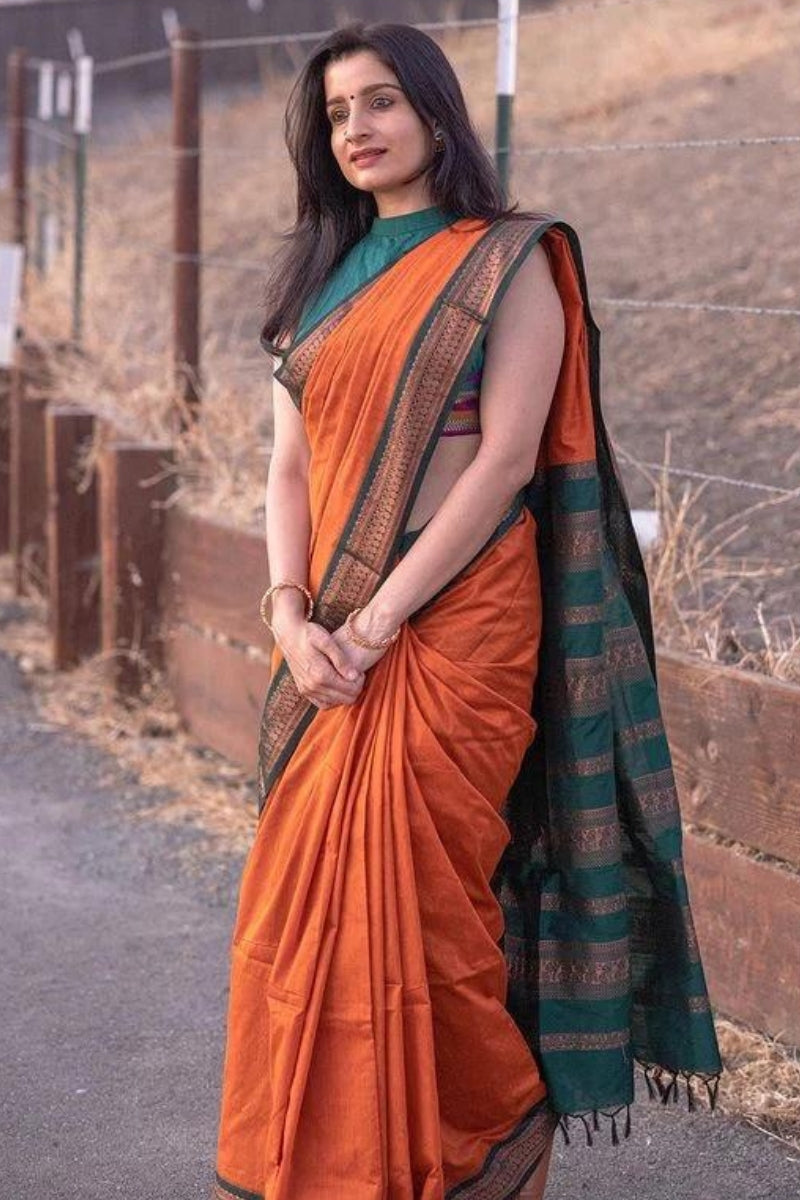 Divine Orange Color Soft Lichi Silk Saree With Blouse Piece