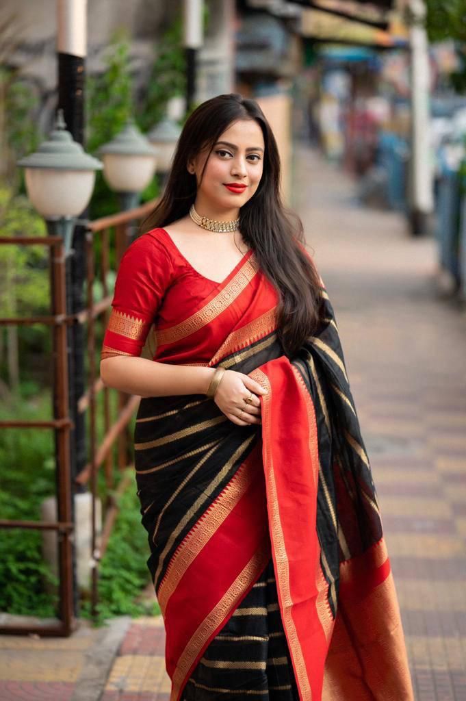 Energetic Black Color Soft Lichi Silk Saree With Blouse Piece