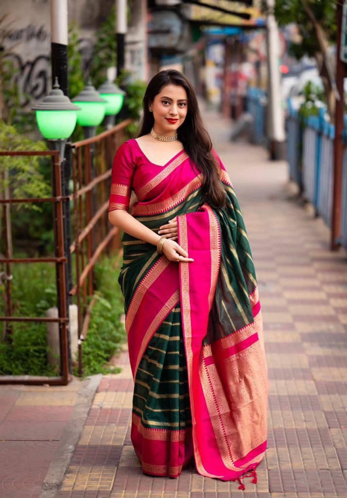 Inviting Dark Green Color Soft Lichi Silk Saree With Blouse Piece