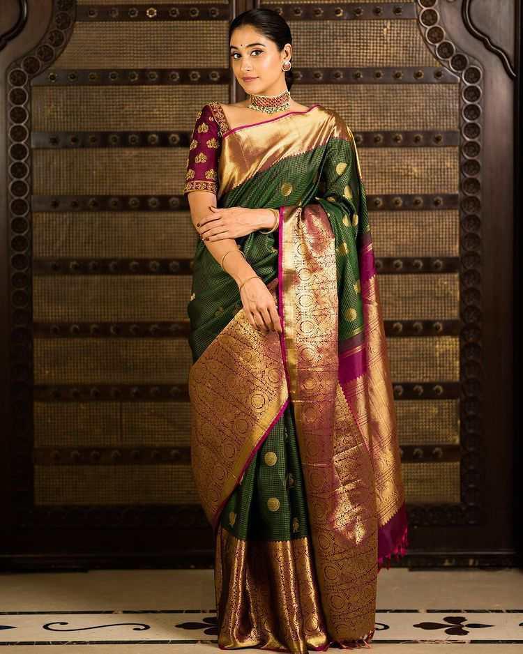 Splendid Green Color Banarasi Soft Silk Saree With Blouse Piece